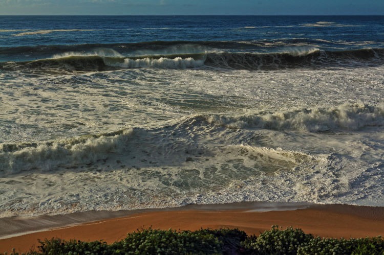 Seascape photograph of the beach wash at Montara