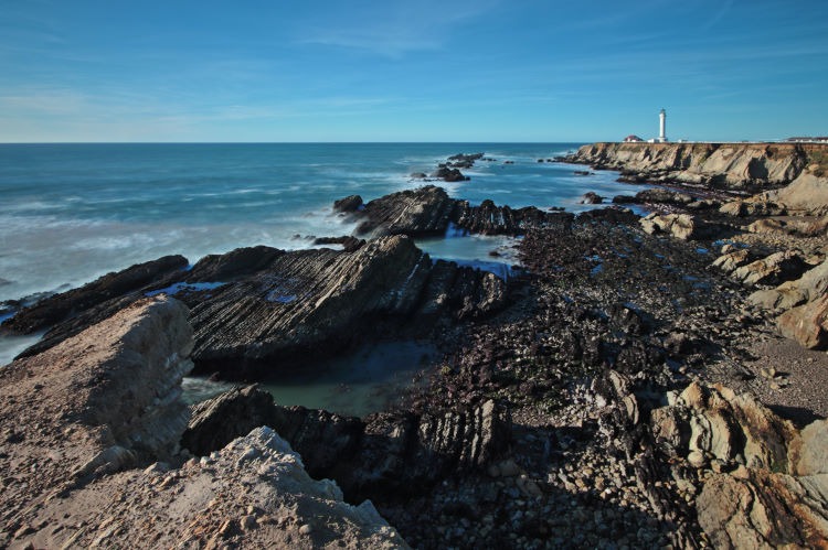 Seascape photograph of the treacherous reef at the Point Arena lighthouse